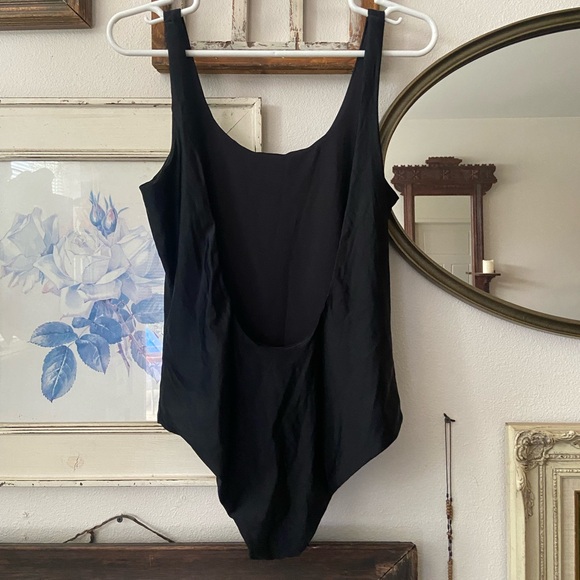 It’s now cool black cheeky bathing suit - Picture 1 of 4